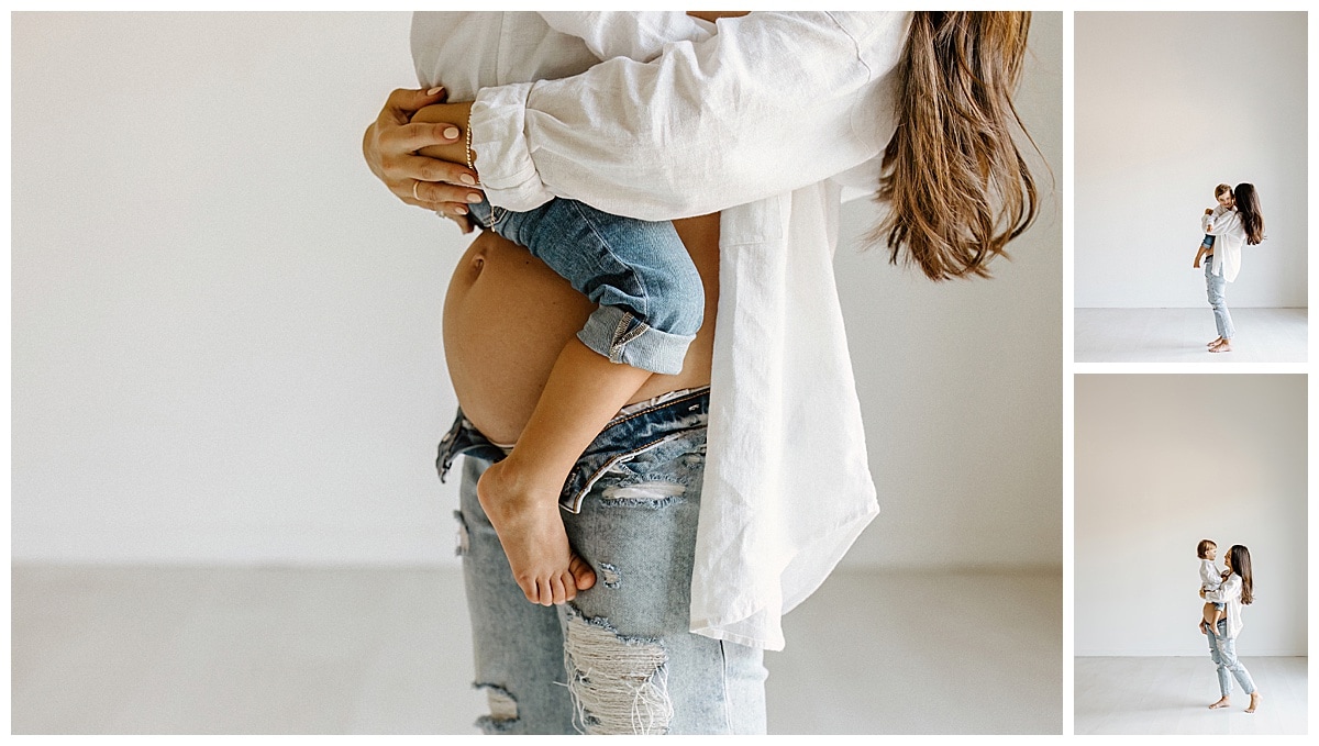 Young boy wraps his legs around pregnant belly for Studio Maternity Photos