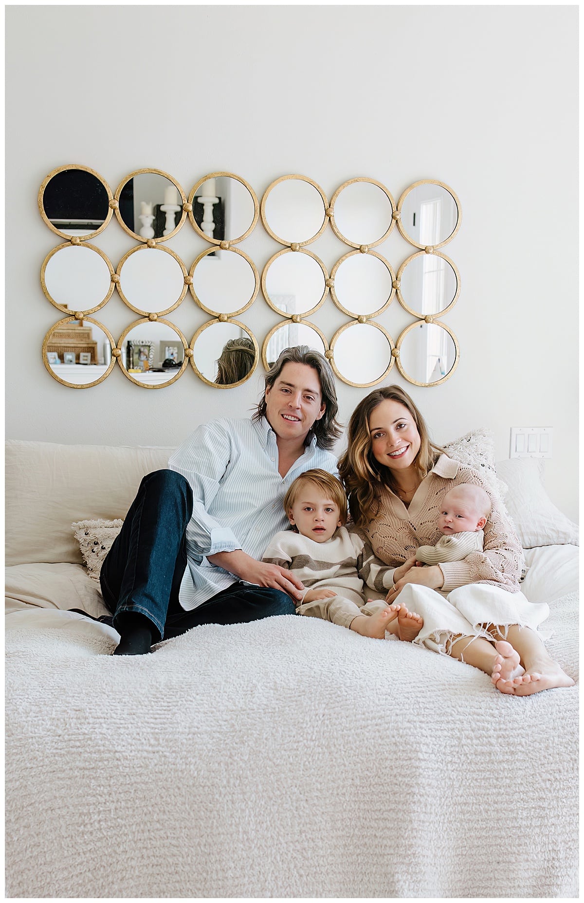 Mom and dad hold their kids close for Austin Motherhood Photographer