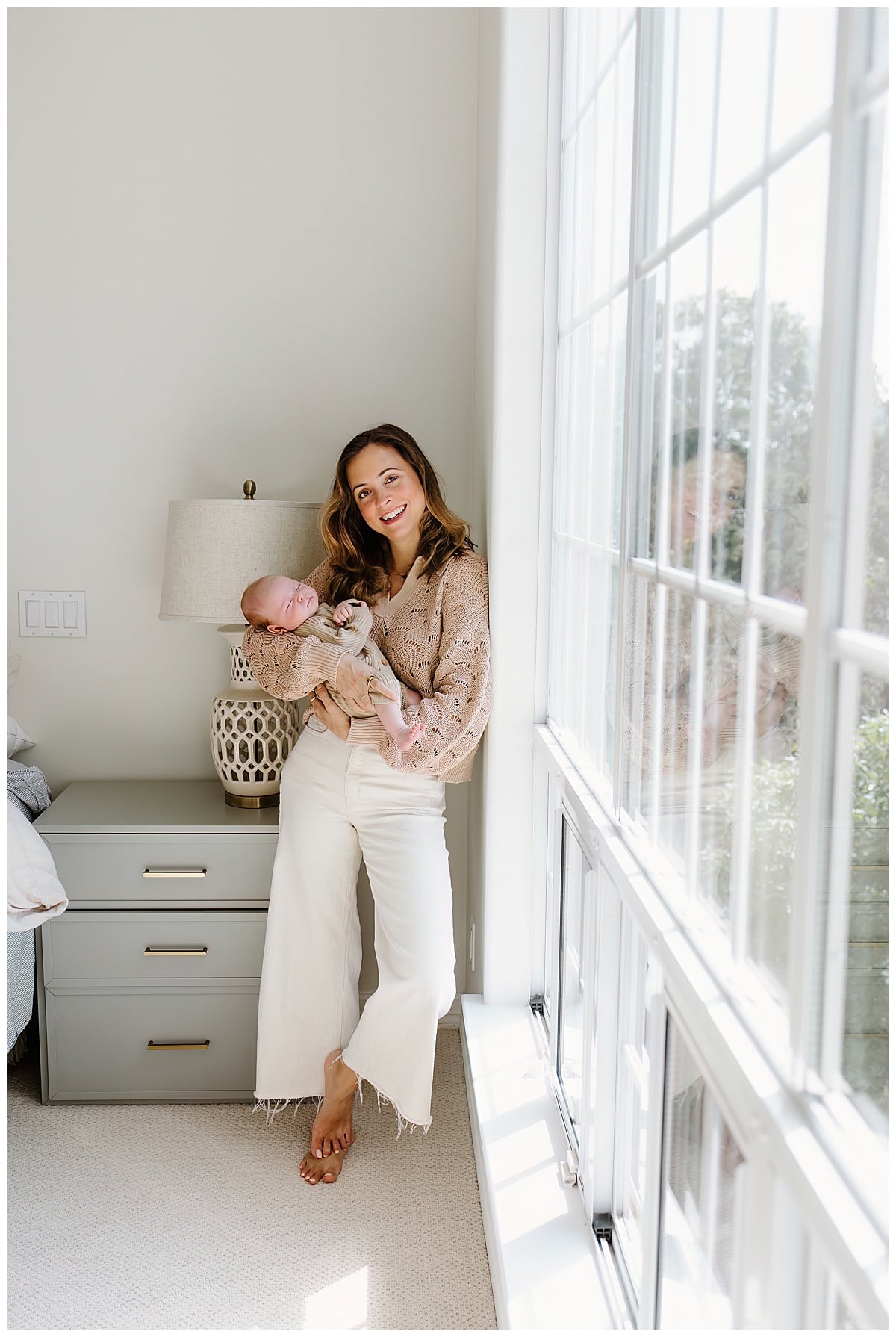 Mother holds newborn baby for Our Adventuring Souls Photography