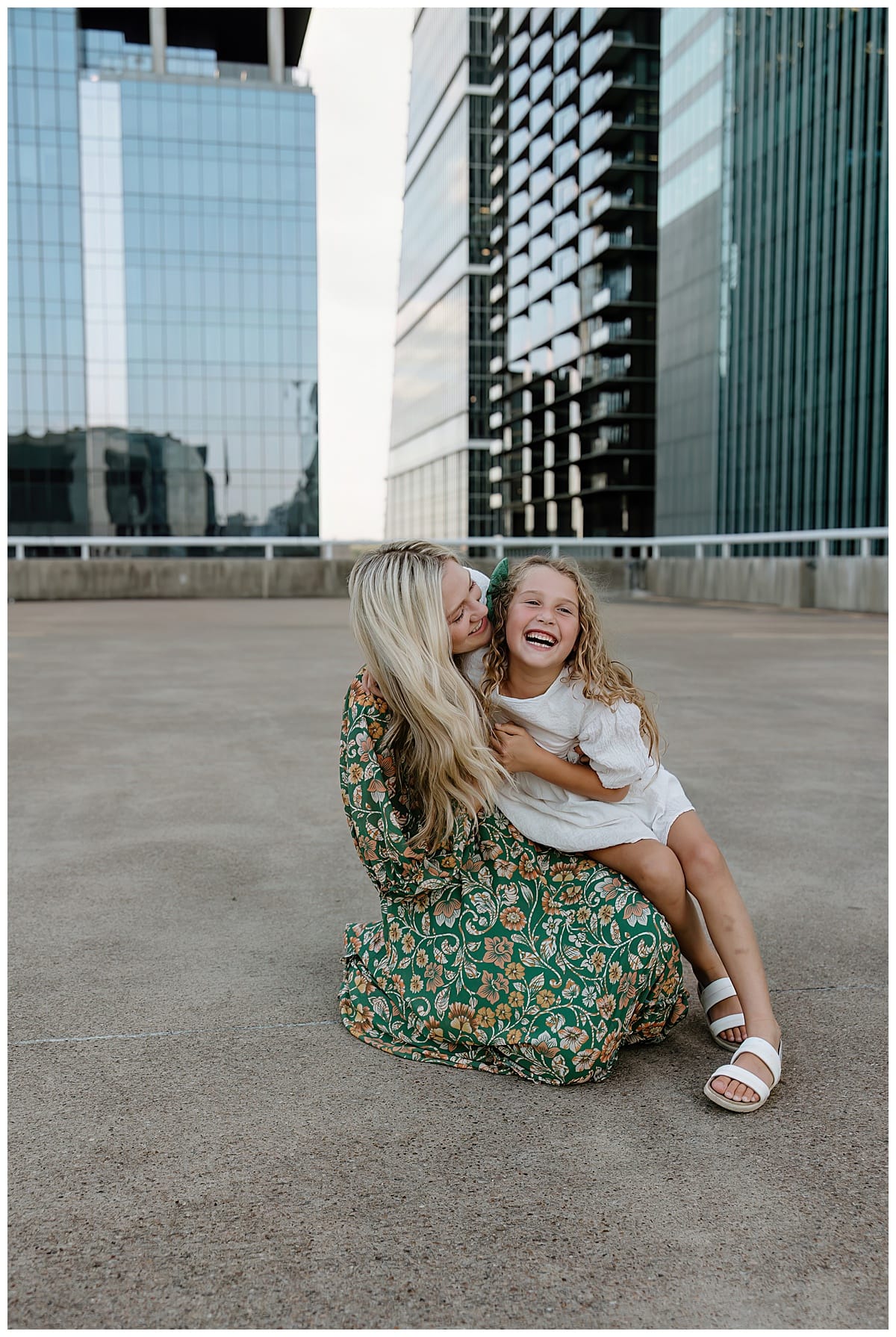 Mom and daughter smile and laugh together for Our Adventuring Souls Photography