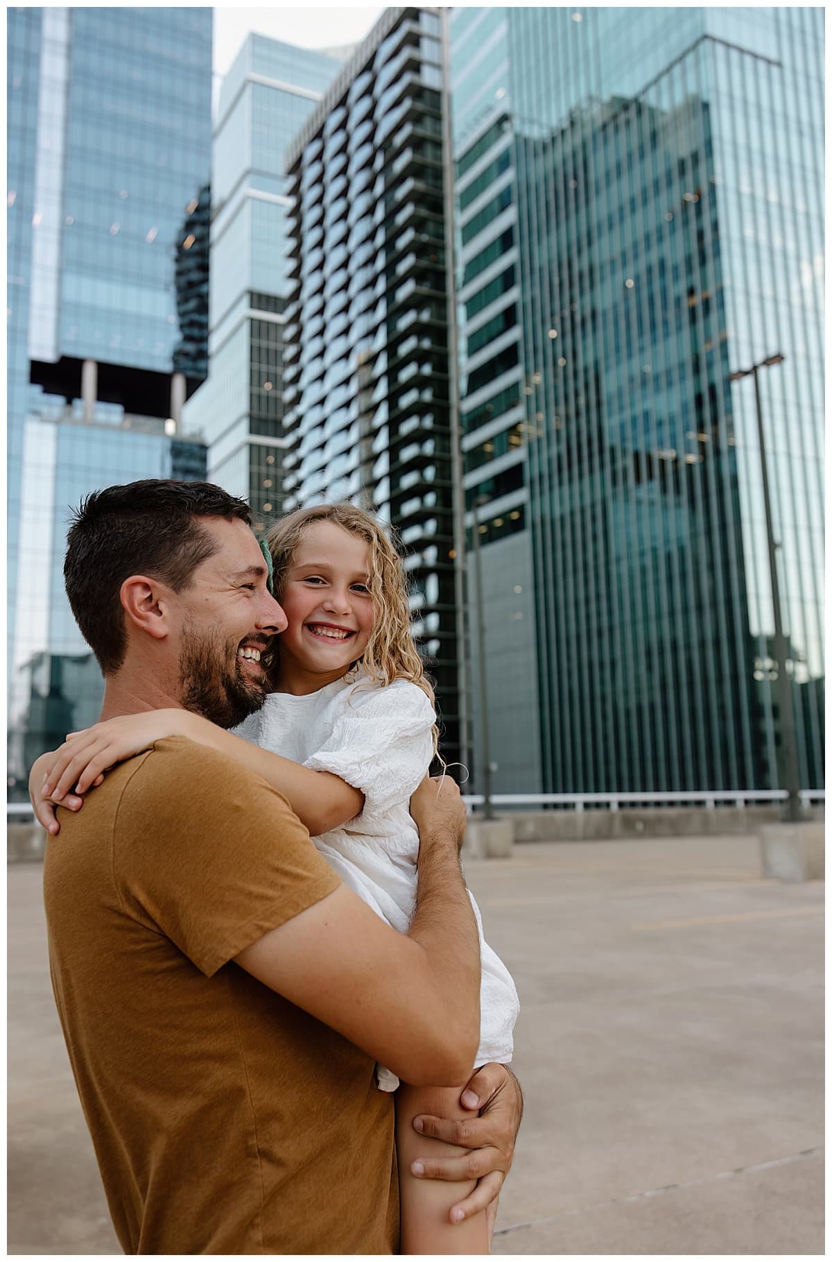 Dad and daughter smile together for Our Adventuring Souls Photography