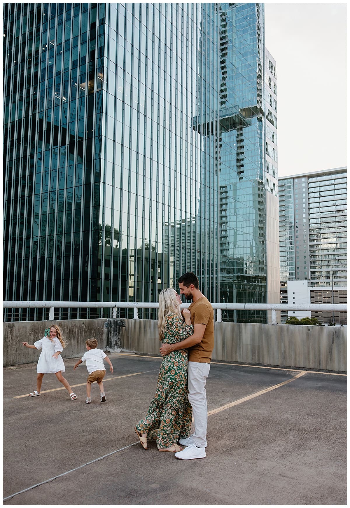Parents look at their kids playing for Our Adventuring Souls Photography