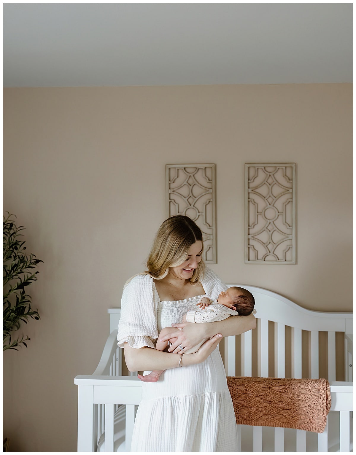 Mother and baby share a tender moment for Our Adventuring Souls Photography
