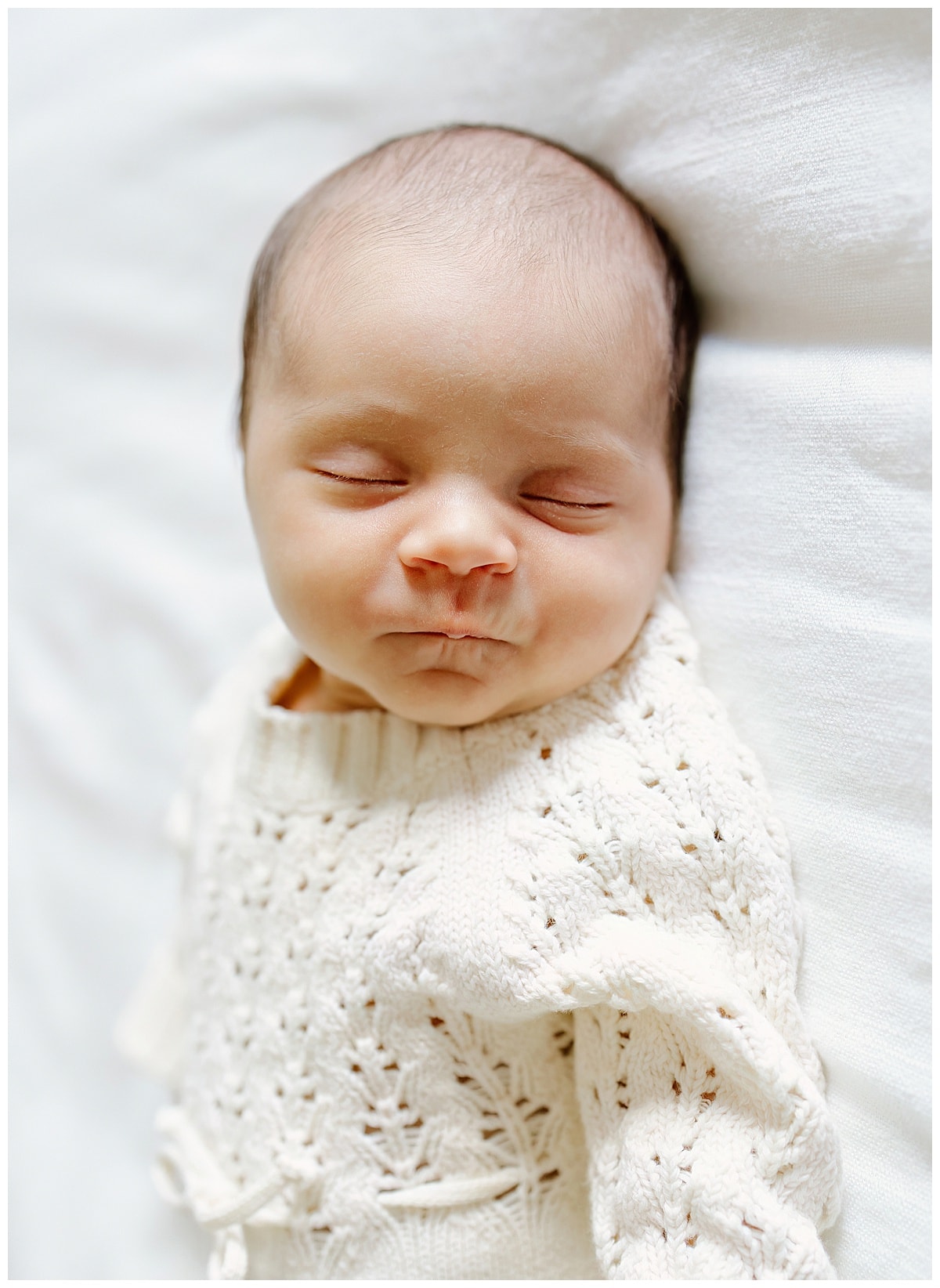 Baby lays on bed for Our Adventuring Souls Photography