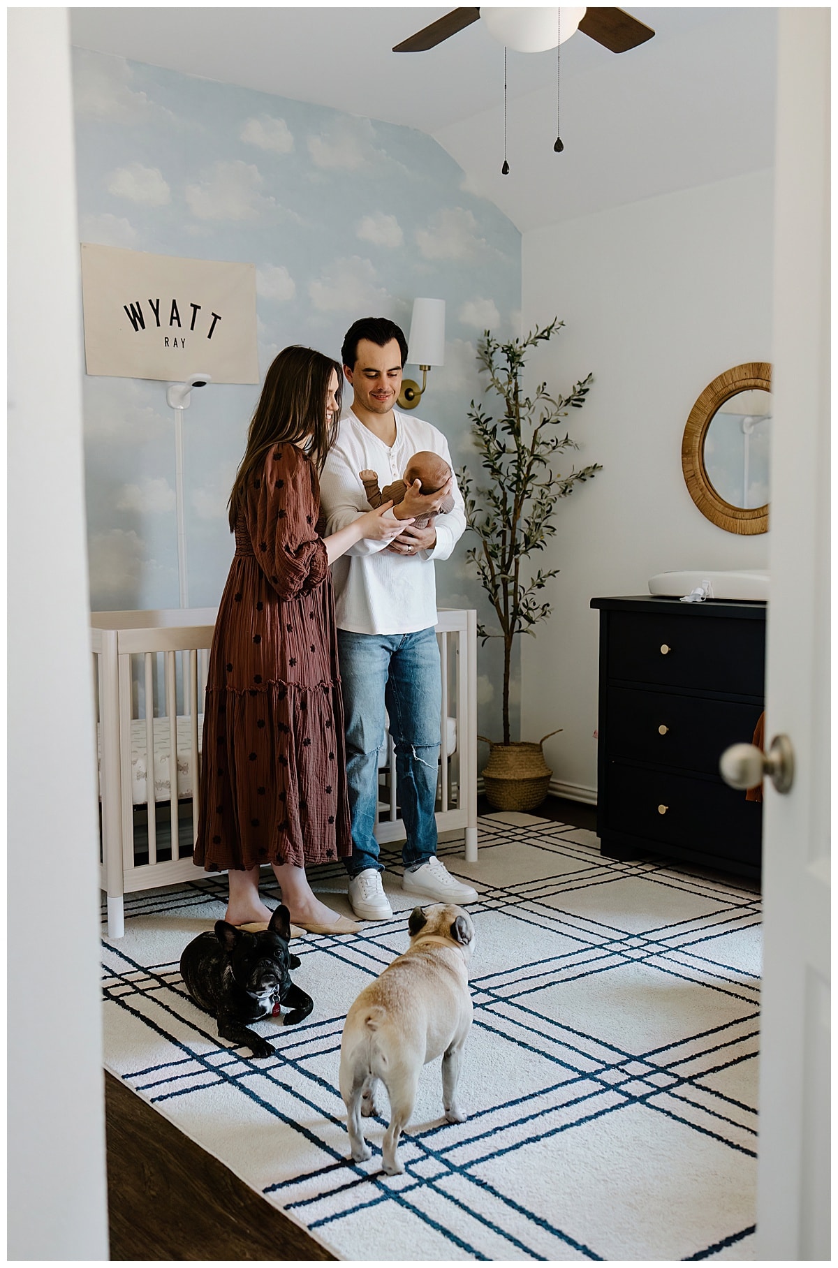 Mom and dad smile at baby for Our Adventuring Souls Photography