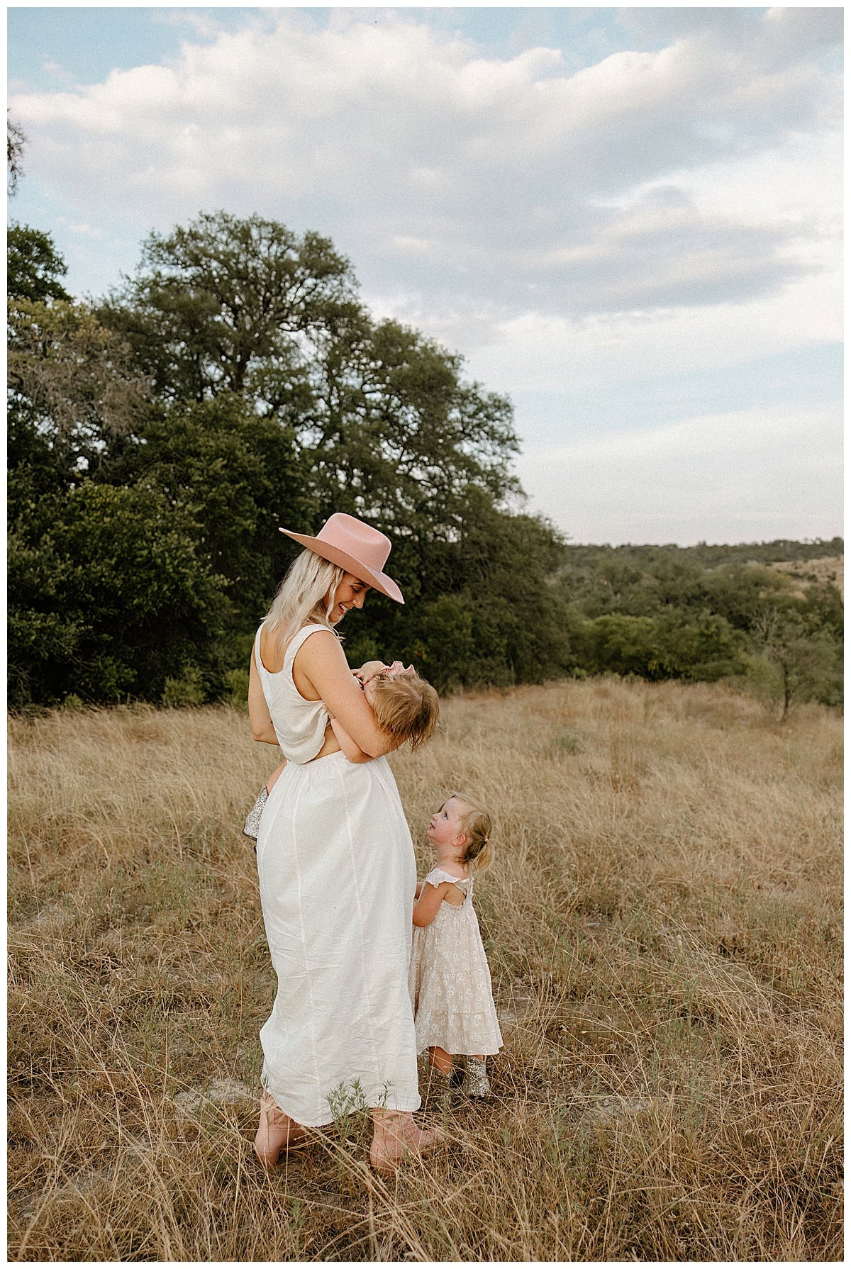 Mom nurses daughter for Outdoor Motherhood Story 