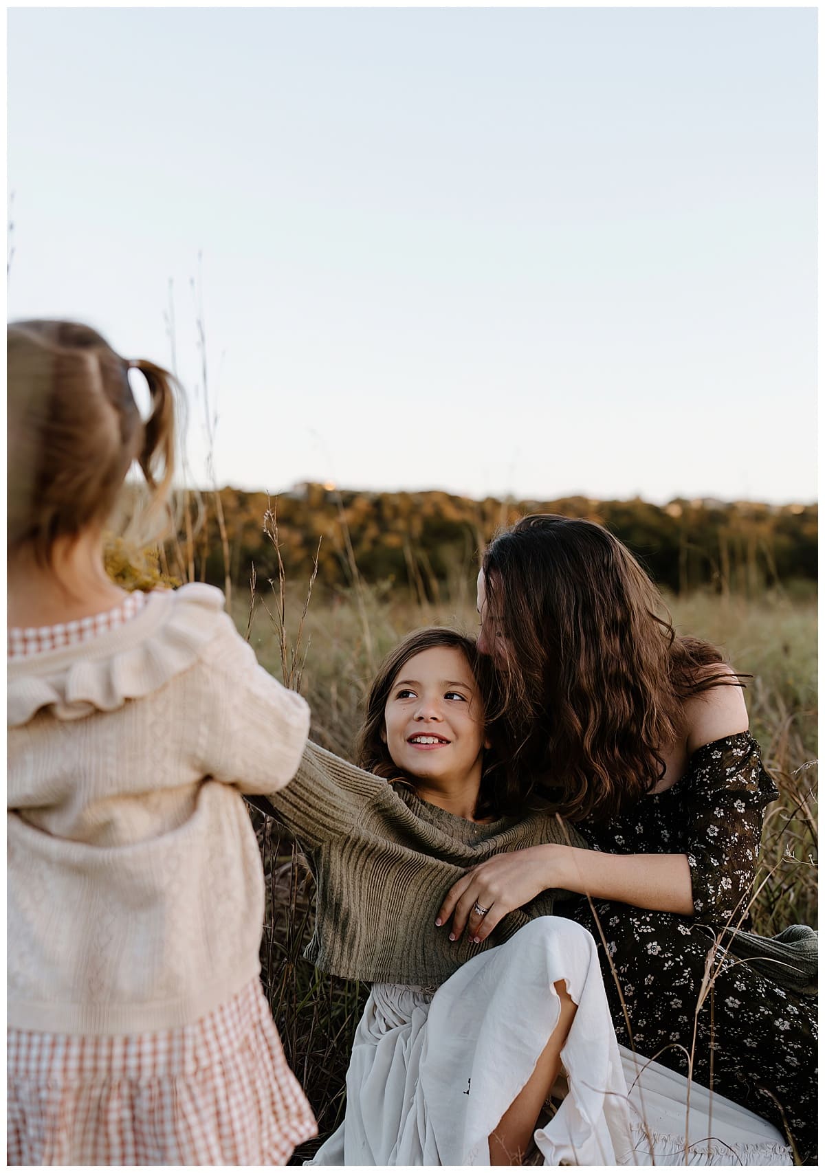 Mom sits with kids on the floor gor Austin Lifestyle Photographer