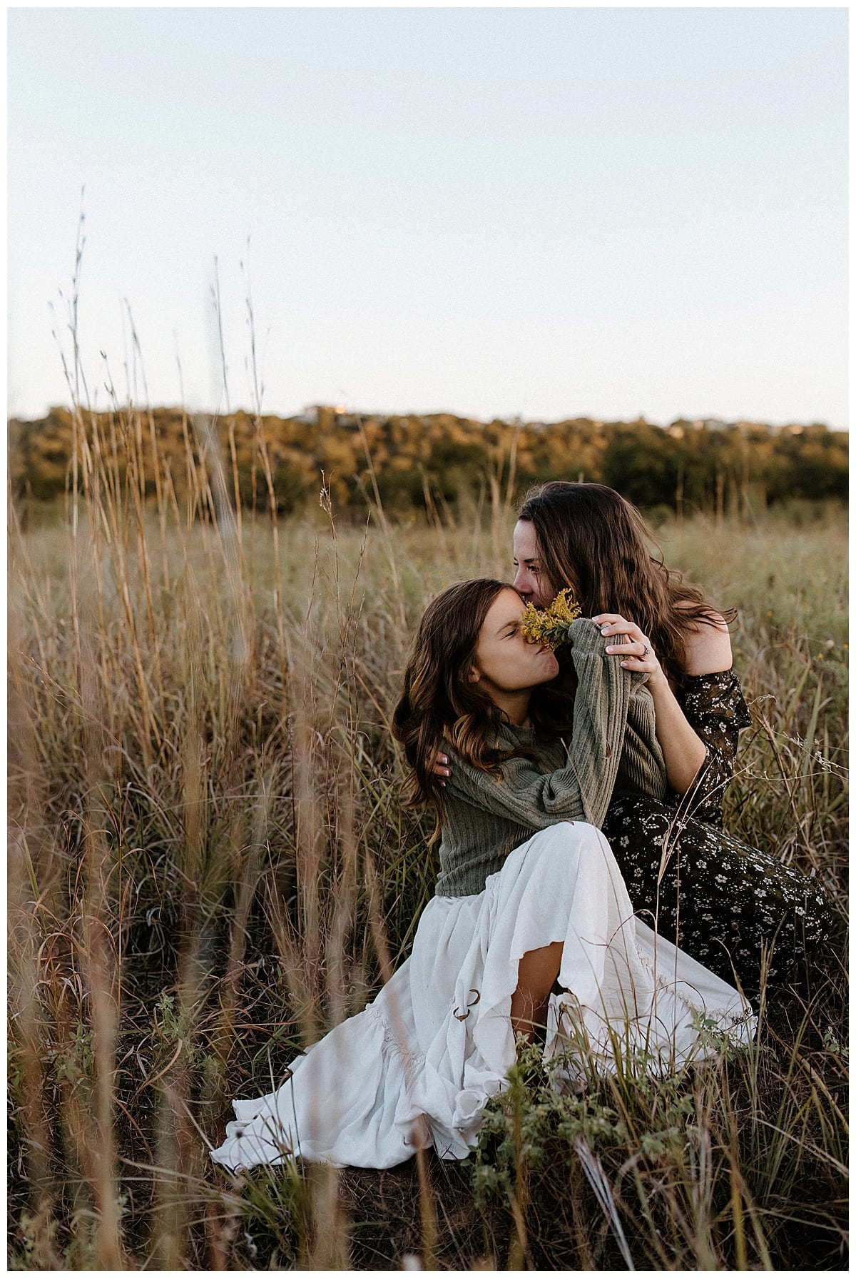 Mom and daughter sit on the floor together for Our Adventuring Souls Photography