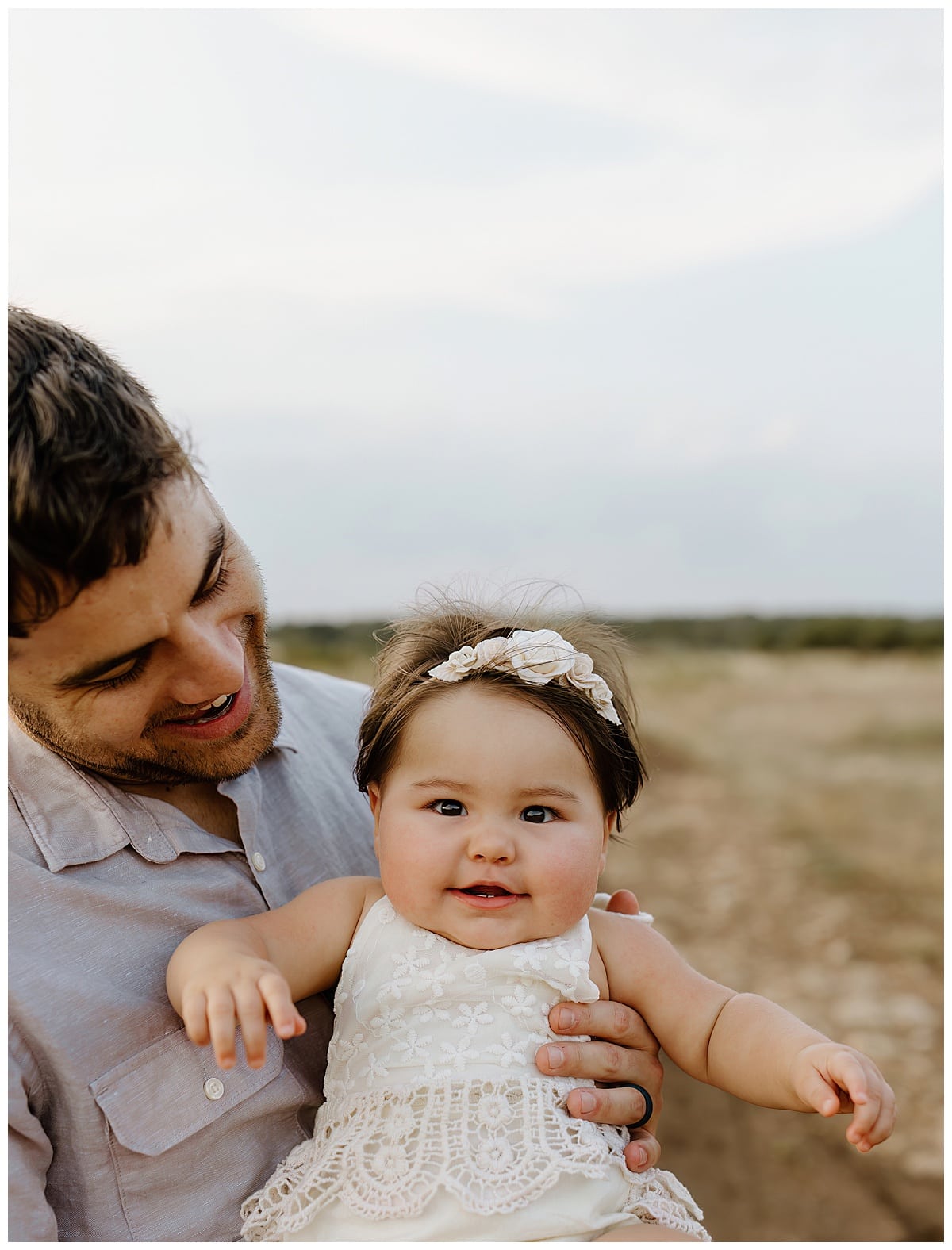Dad and baby smile together for Our Adventuring Souls Photography