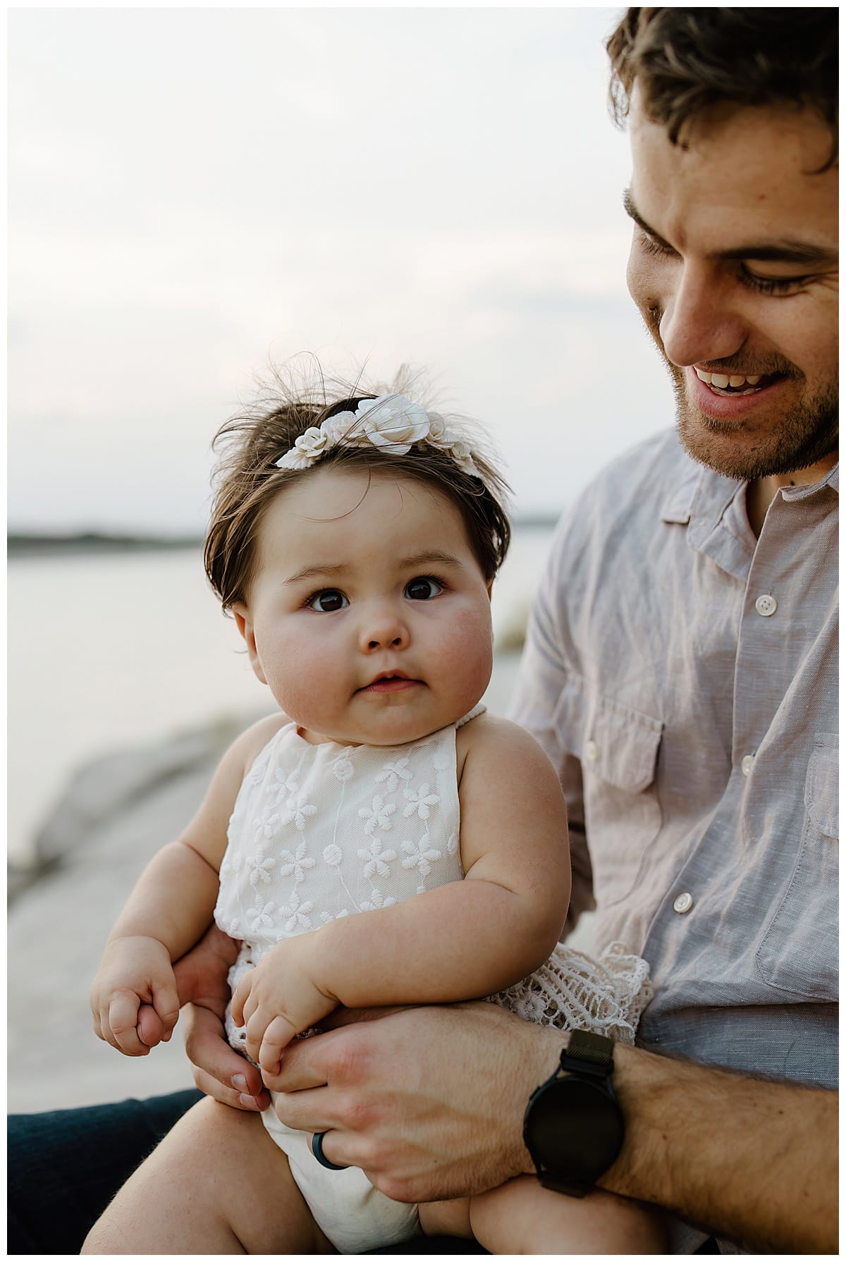 Dad smiles at baby girl for Our Adventuring Souls Photography