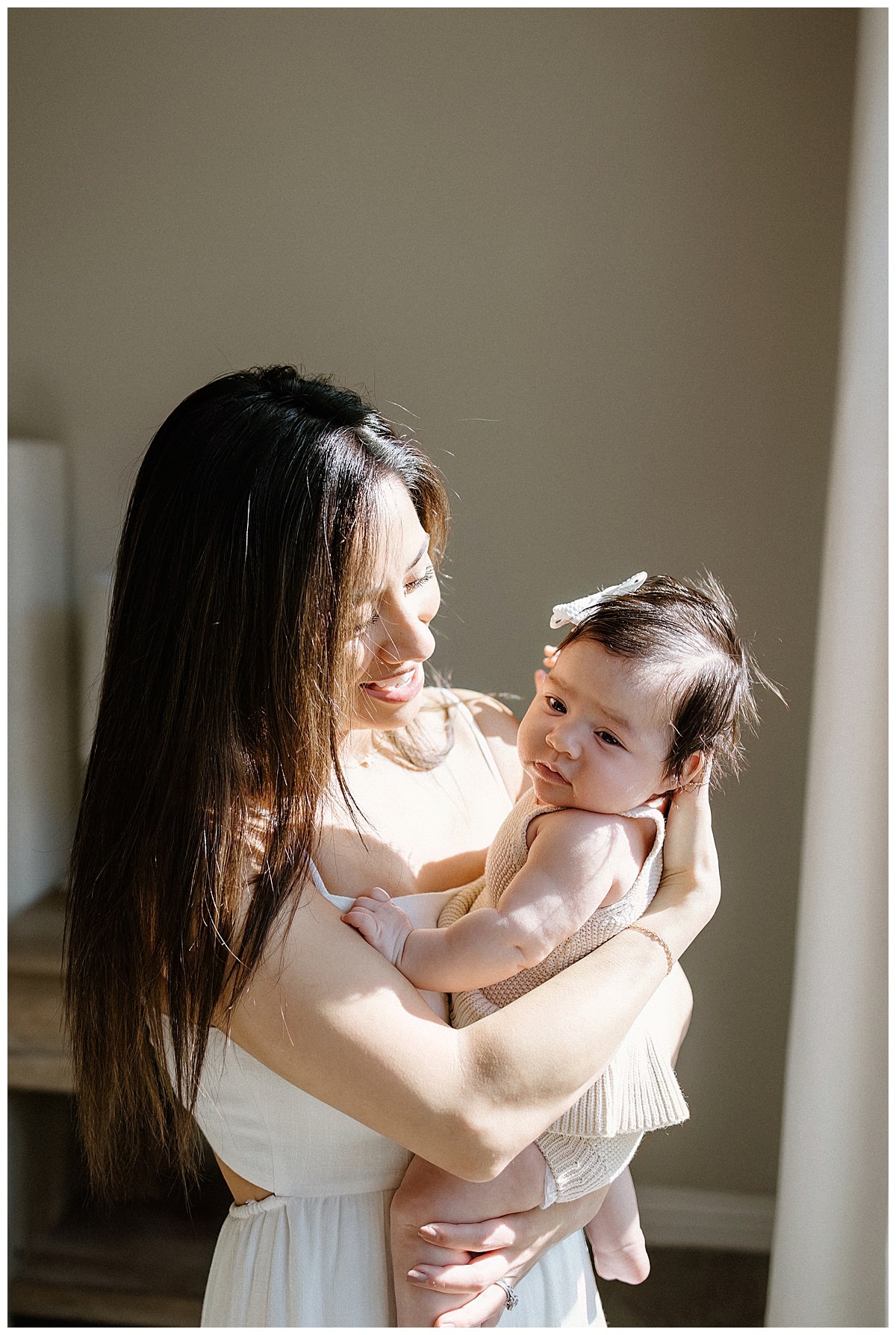 Mom smiles at baby girl for Austin Motherhood Photographer