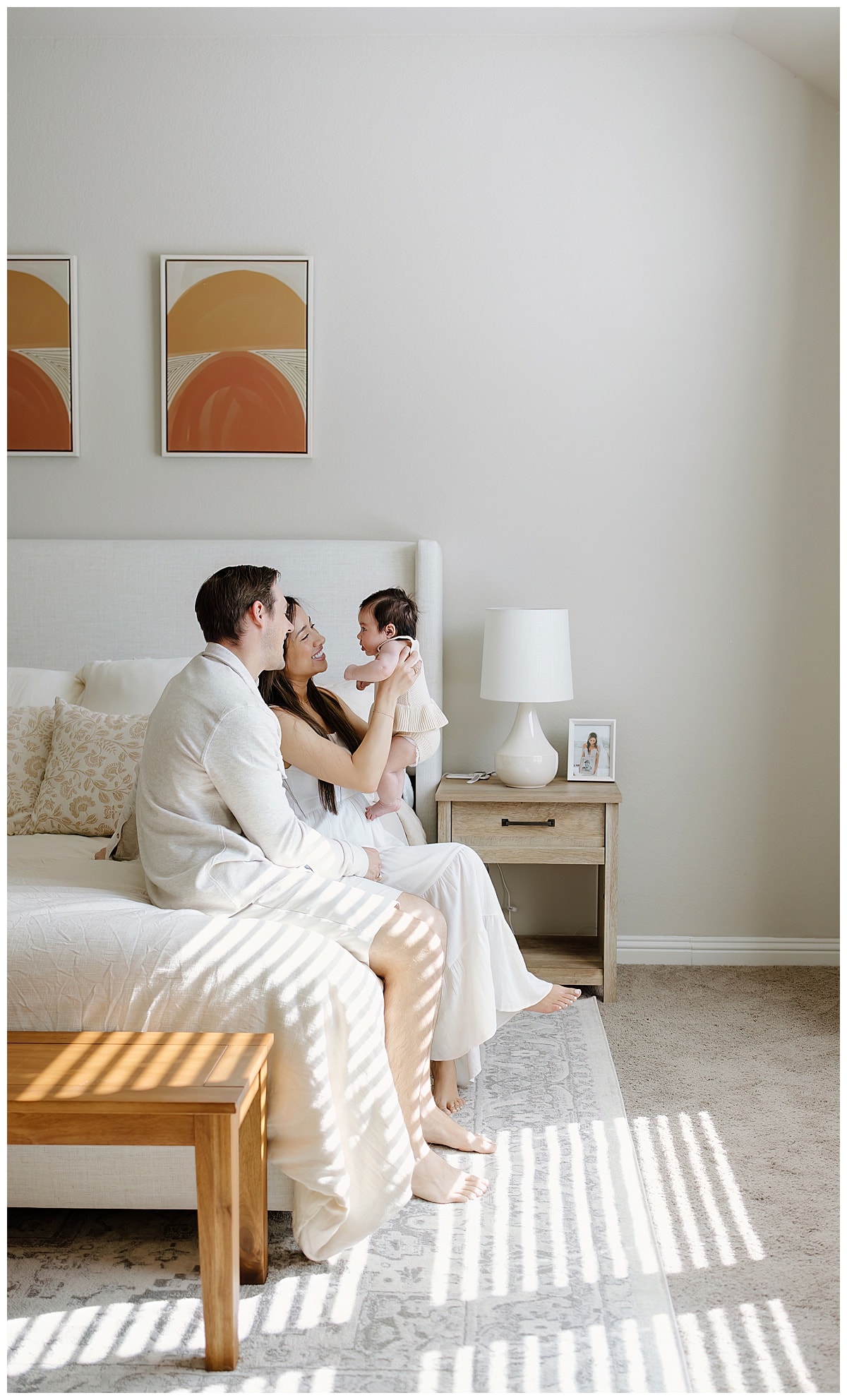 Mom and dad hold baby for Austin Motherhood Photographer