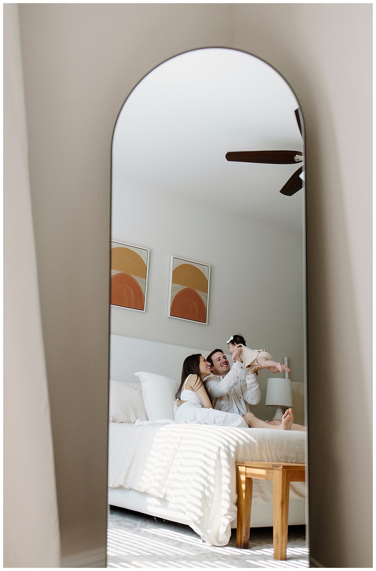 Mother and father play with their baby girl for Austin Motherhood Photographer
