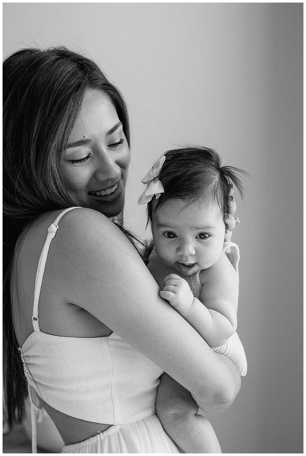Mom holds baby close understanding the importance of being able to Document Your Newborn