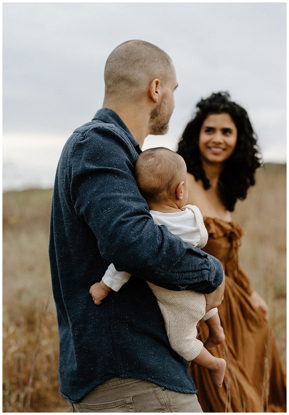 Mom and dad smile at one another for Austin Lifestyle Photographer