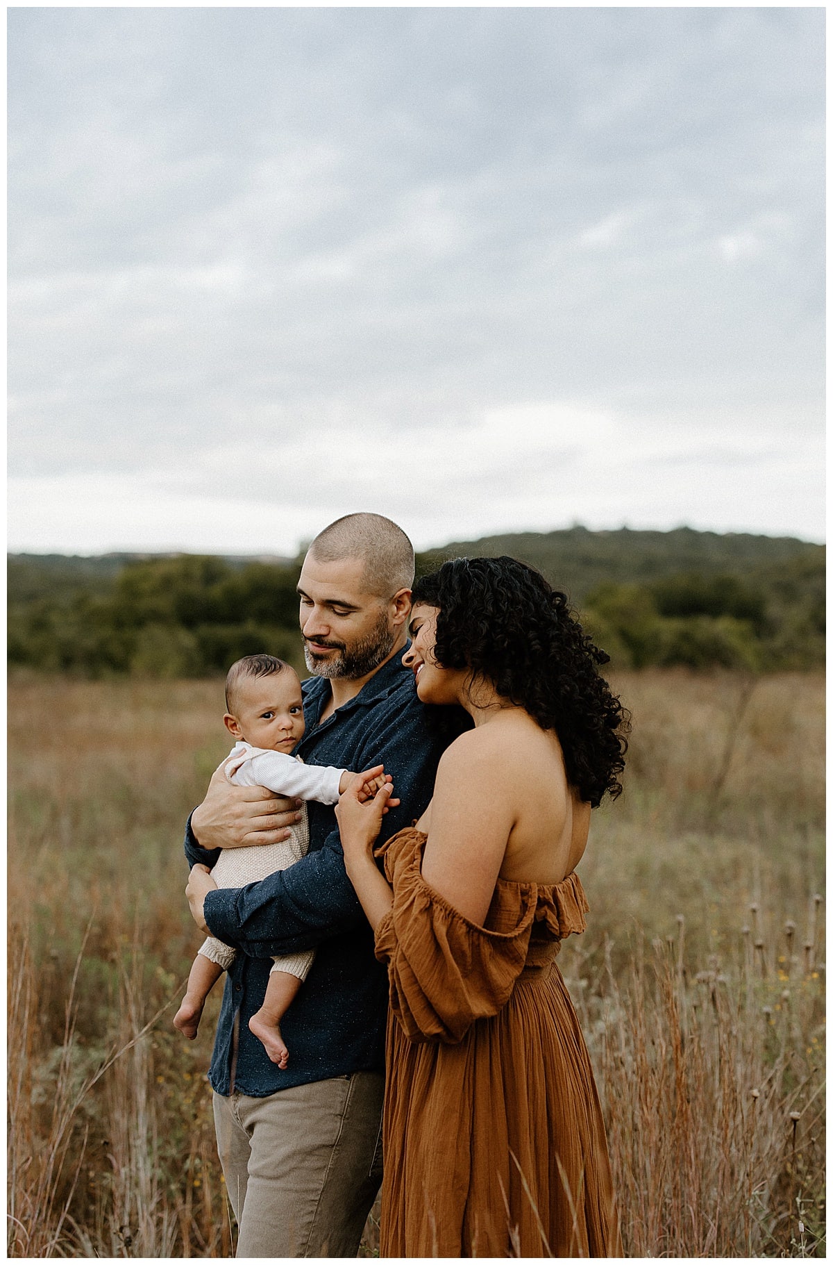Parents smile at their son for Our Adventuring Souls Photography