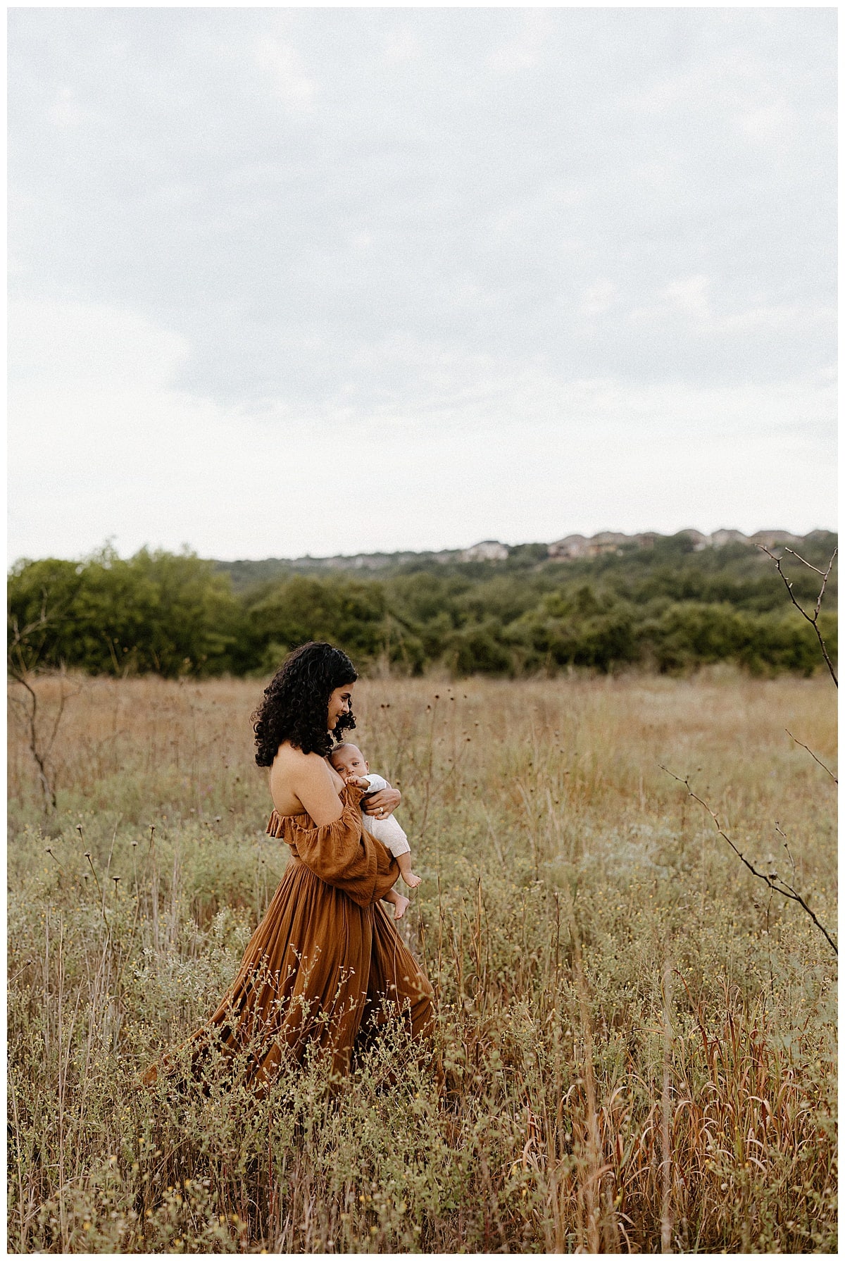 Mom holds their son for Our Adventuring Souls Photography