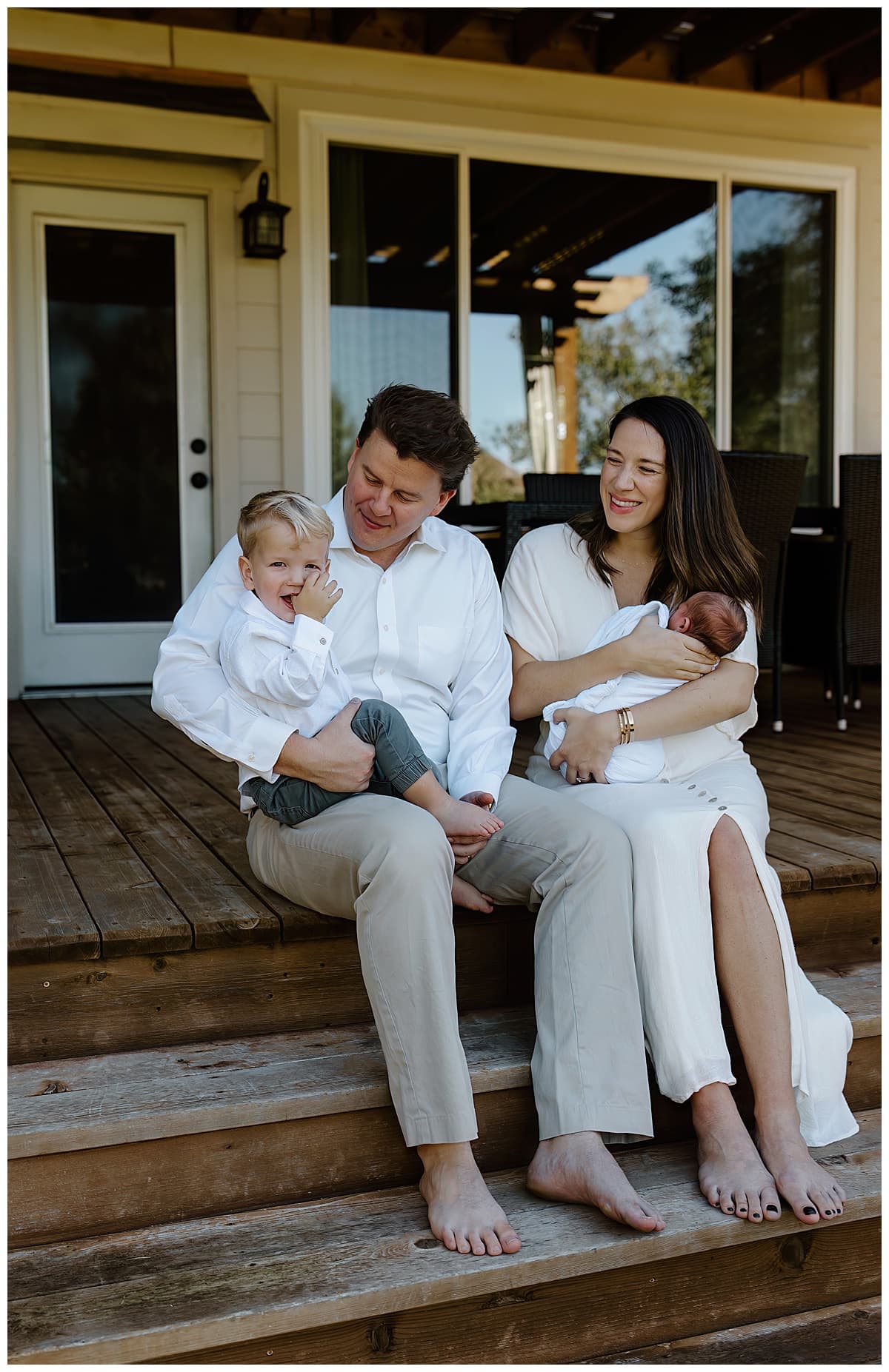Parents smile at their son for Our Adventuring Souls Photography