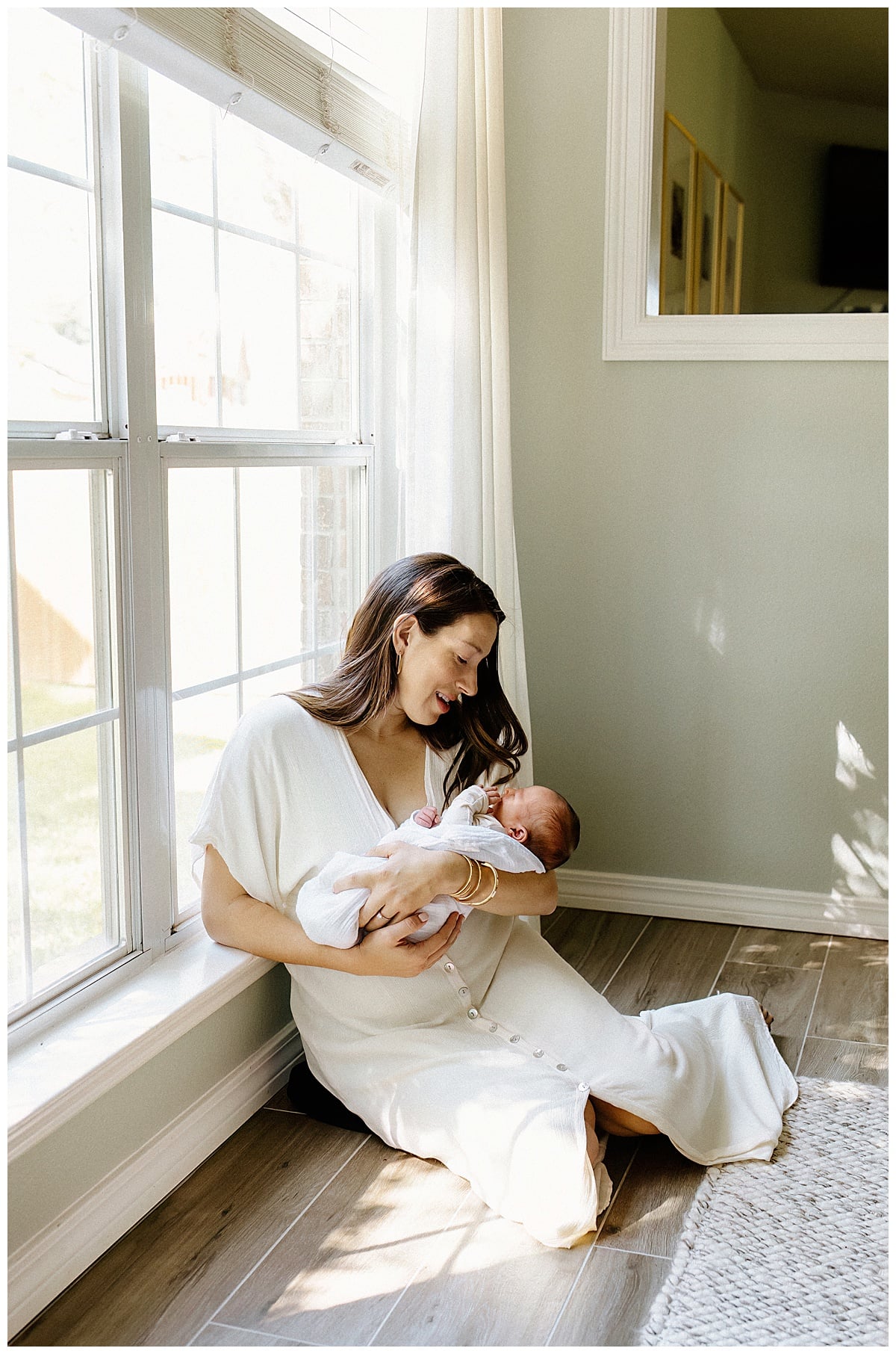 Mother sits on the floor with baby for Our Adventuring Souls Photography