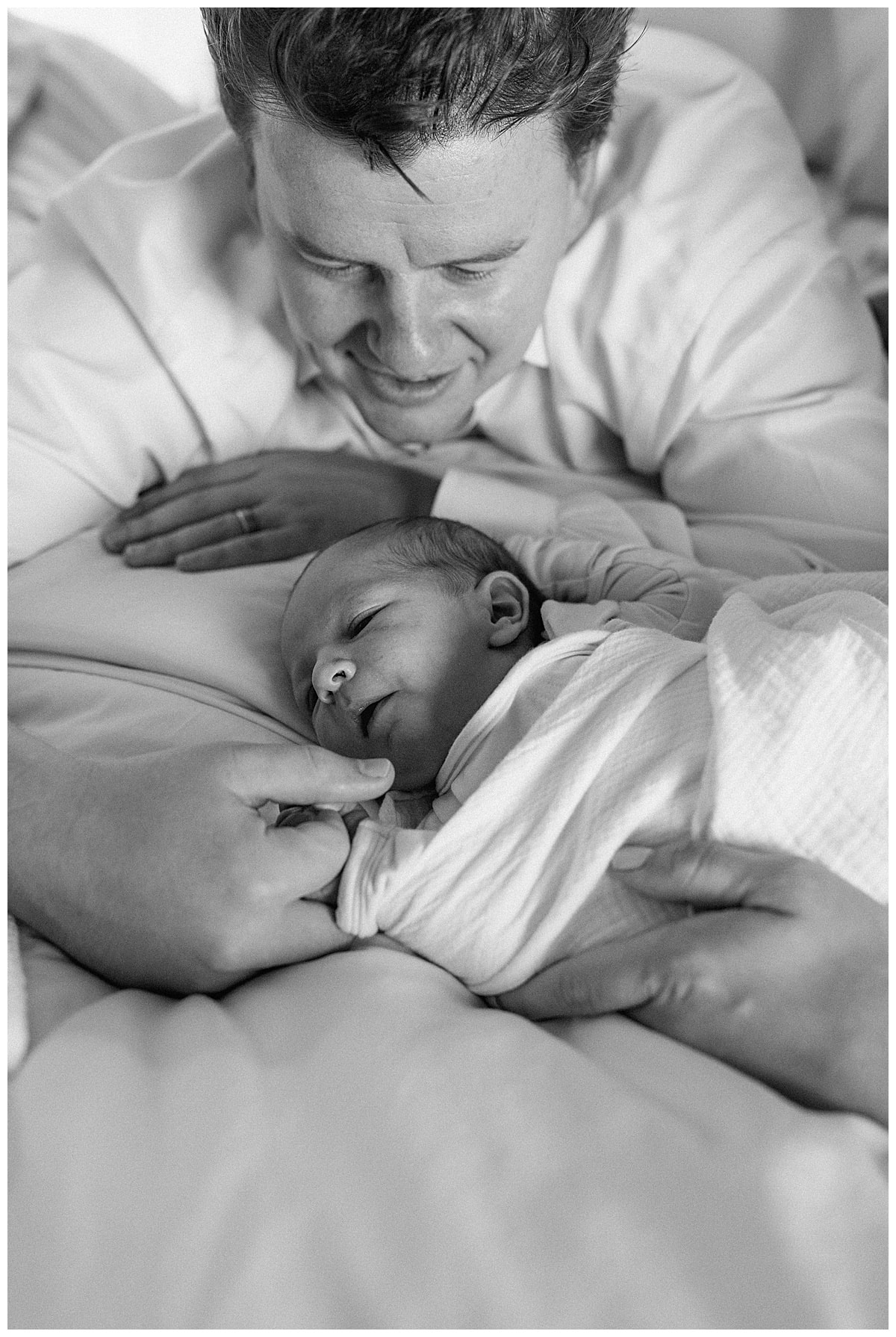 Mom and dad cuddle with baby for Our Adventuring Souls Photography
