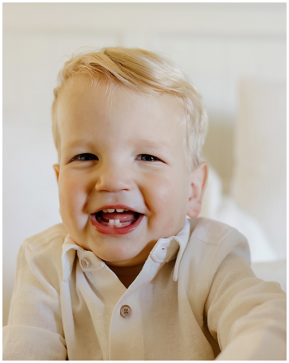 Young boy smiles big for Austin Lifestyle Photographer