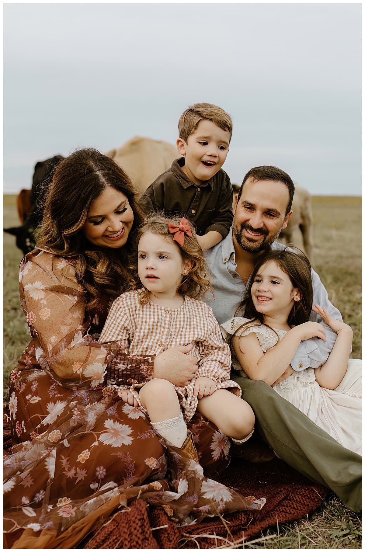 Parents hold their little ones close during their Family Adventure Session