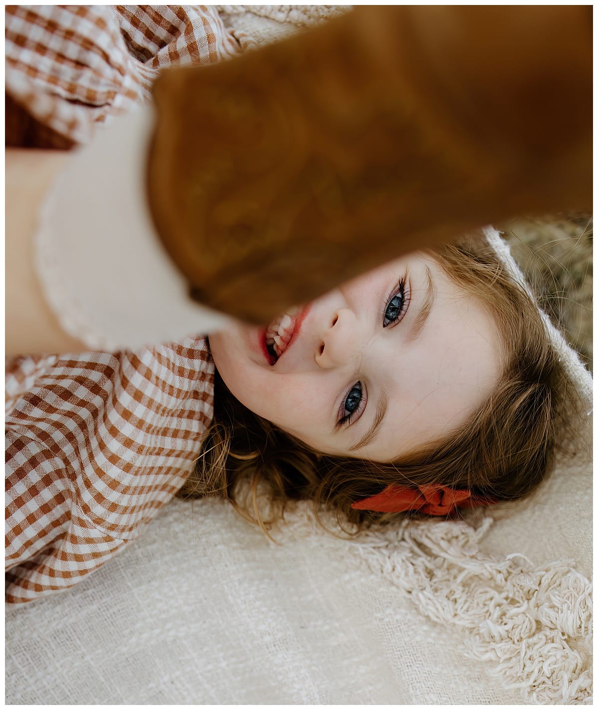 Little girl smiles big for Our Adventuring Souls Photography