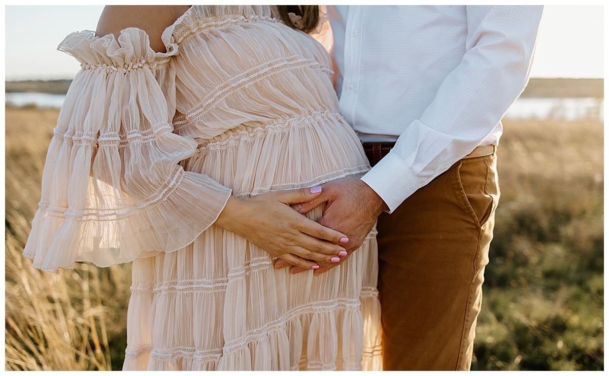 Mom and dad hold pregnant belly for Austin Motherhood Photographer