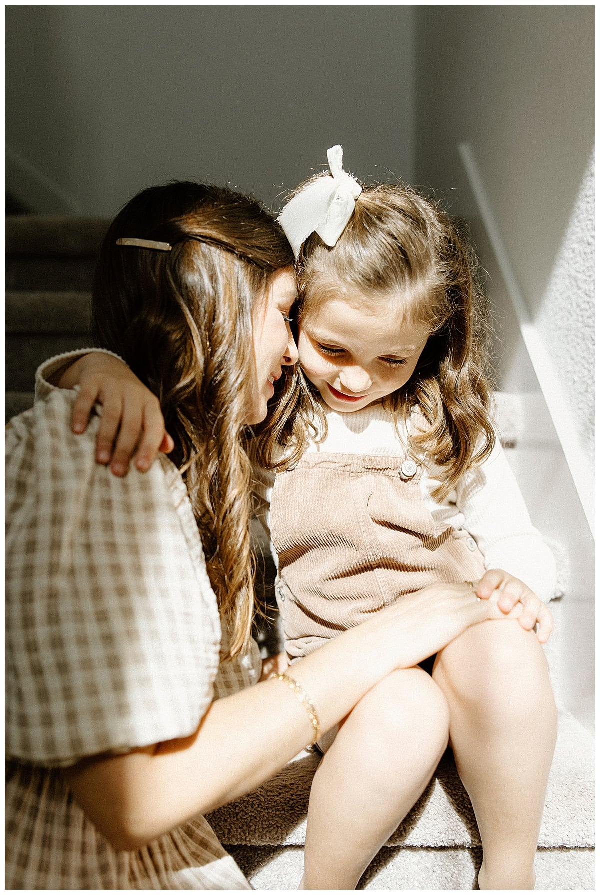 Mom leans into young daughter for Our Adventuring Souls Photography