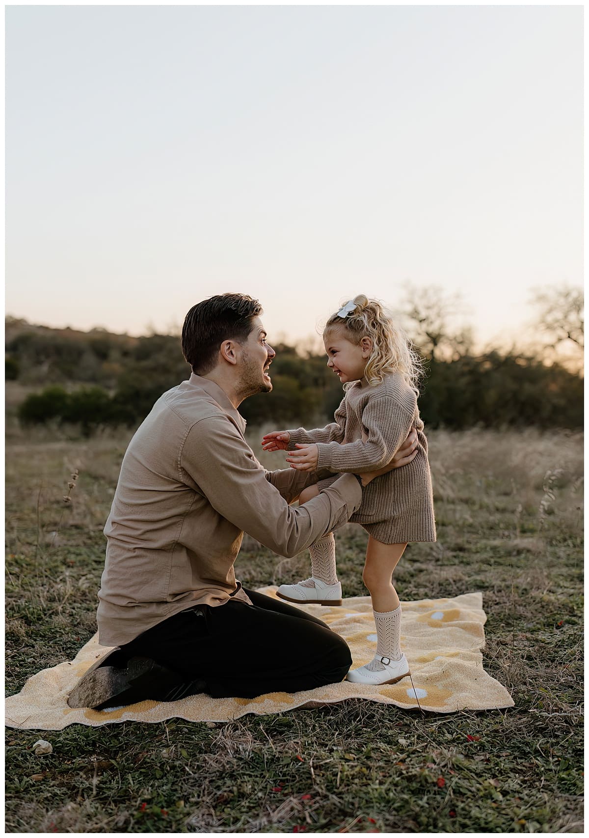 Dad and daughter smile at one another for Our Adventuring Souls Photography